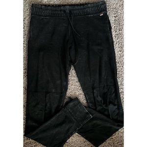 Black yoga leggings with plastic